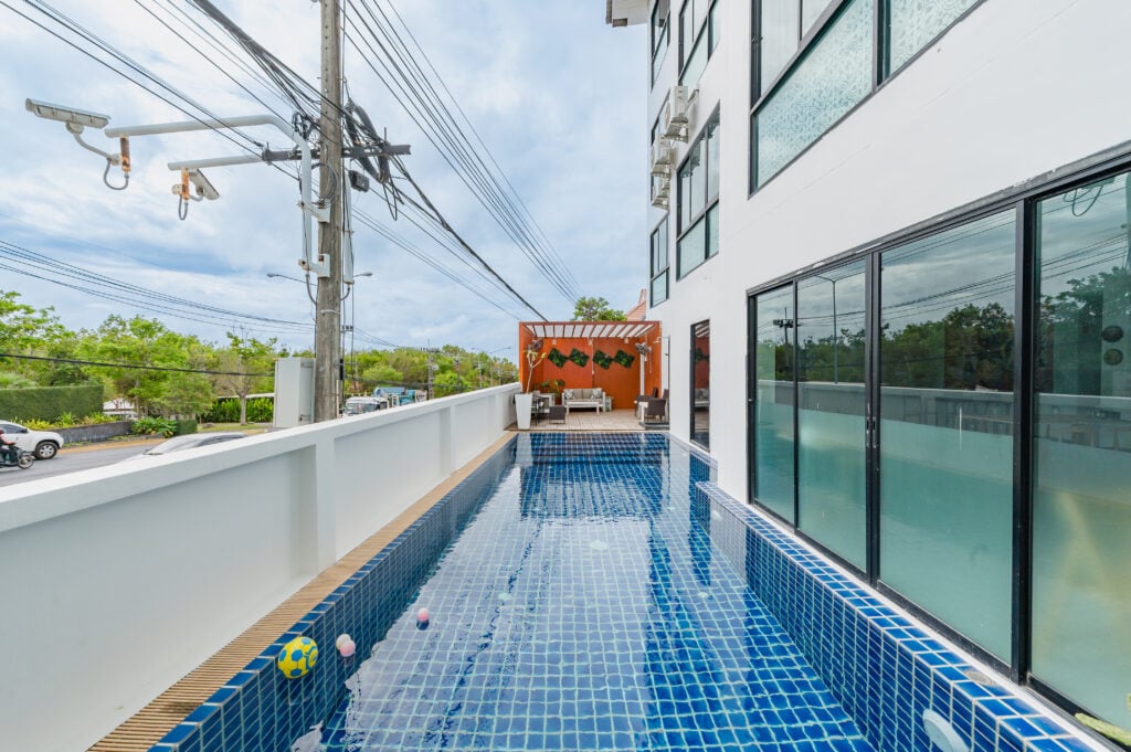 Poolside walkway along the building