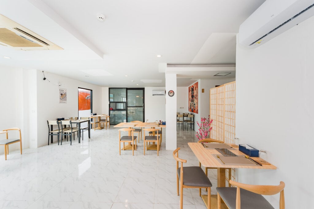 Sea Turtle Cafe with wooden tables and shoji screens